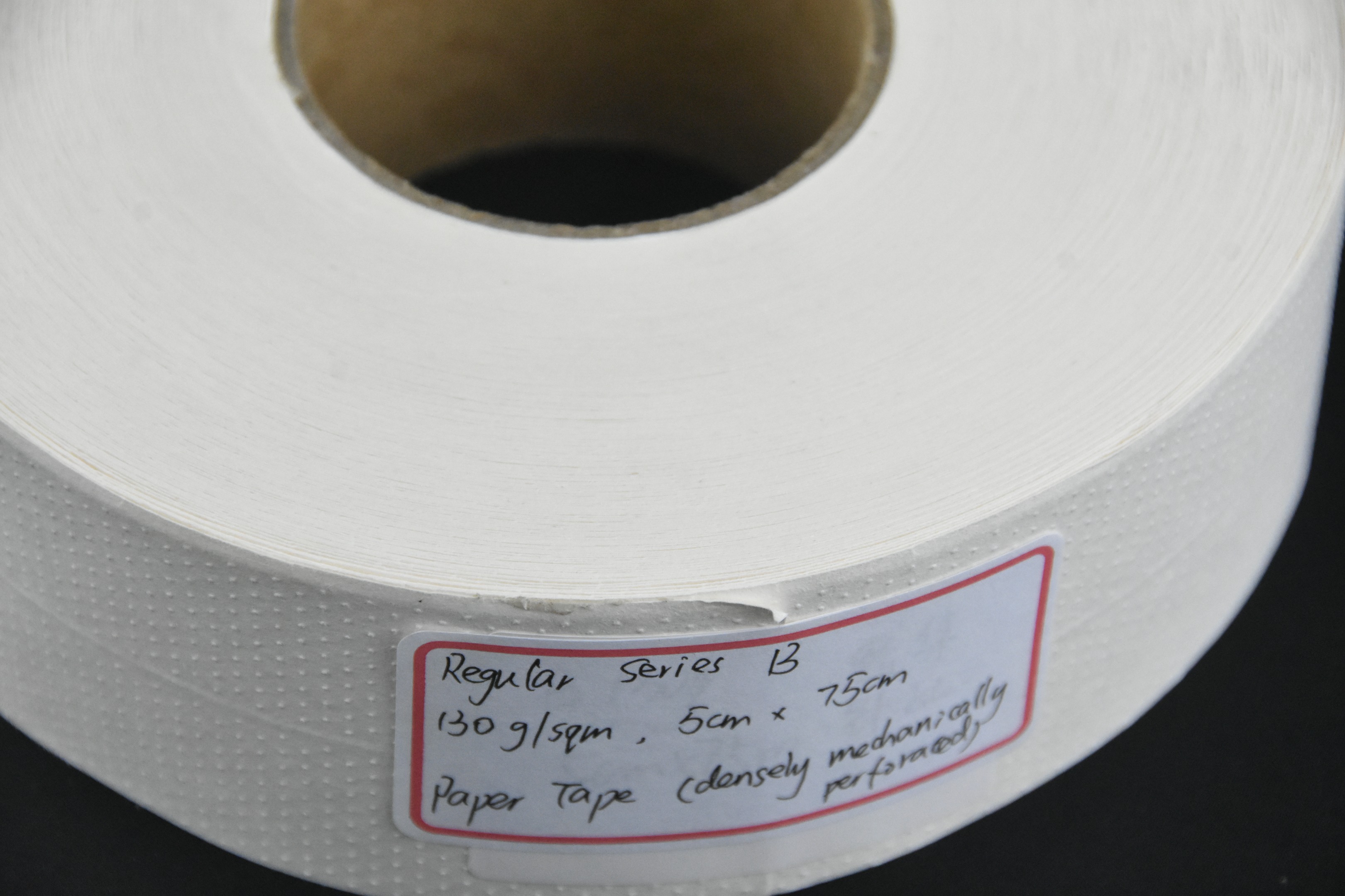 Mechanical hole drywall paper tape